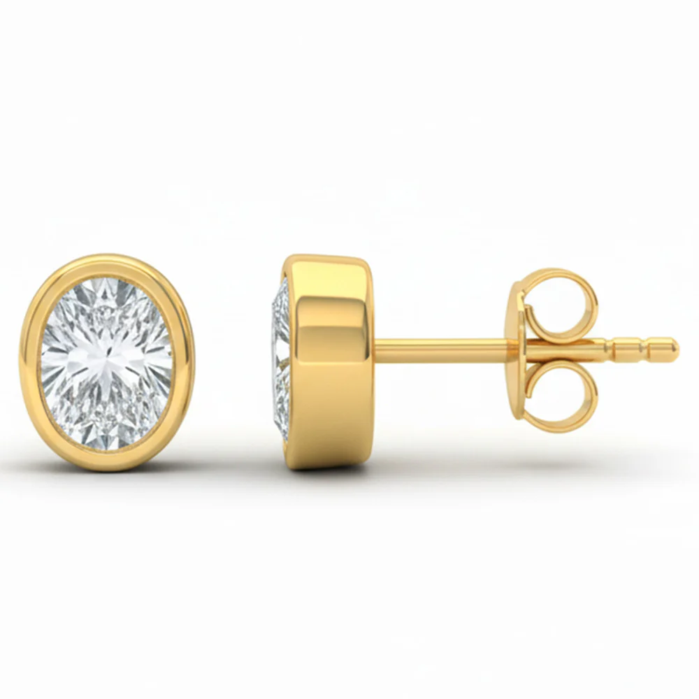 .16ct G SI 14kt Yellow Gold Oval Diamond Bezel Set Stud Earrings